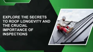 Construction worker in white safety helmet and red pants performing maintenance on a sloped black metal roof under a cloudy sky.